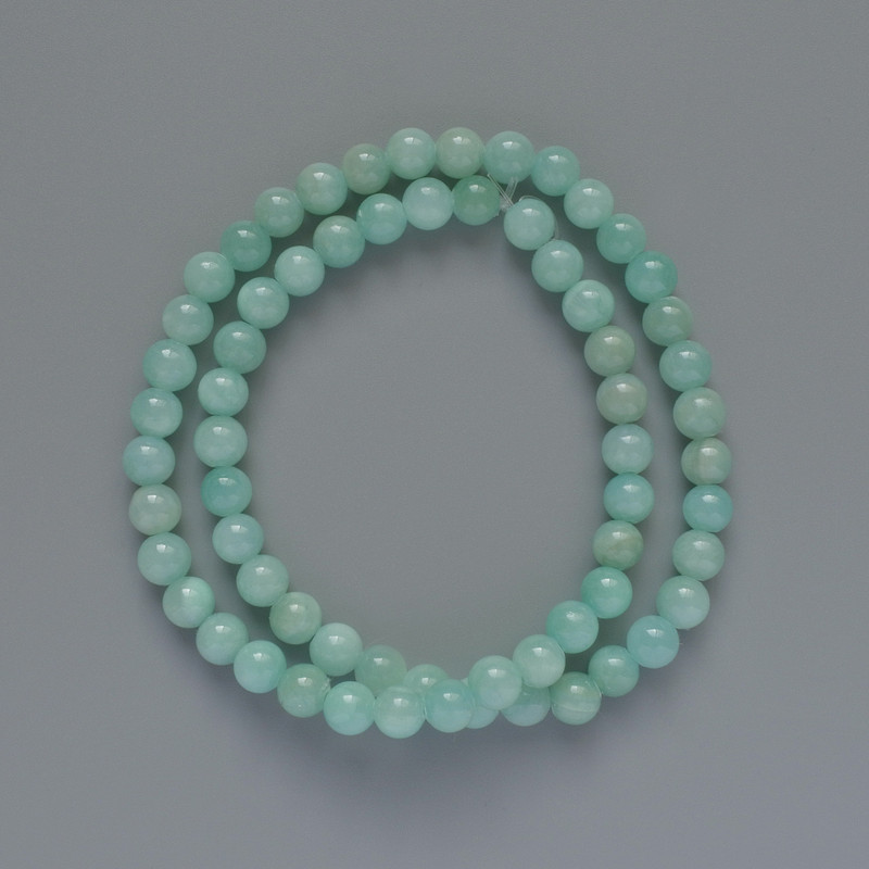 Amazonite beads (synthetic acrylic) smooth round beads, 6.5 mm diameter, length approx. 40 cm on beading thread
