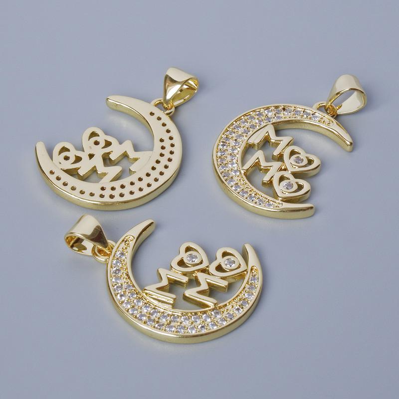 Pendant 'Moon' with white crystals, gold-tone metal, diameter 26x17 mm