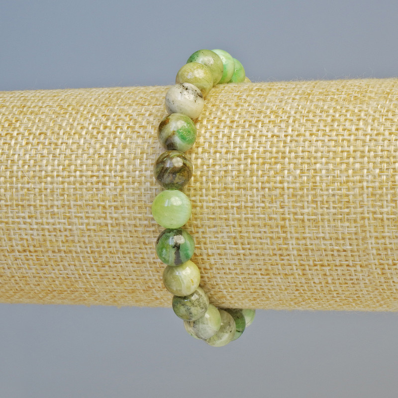 Bracelet of synthetic chrysoprase (acrylic) — smooth beads, 8.5 mm diameter ±, stretch, length 18 cm