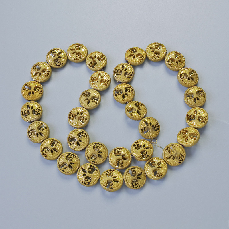 Hematite beads 'Tree' matte golden color, 12.5 x 4.5 mm diameter, length about 41 cm on a thread