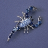 Scorpion Brooch with blue and light blue crystals, silver-tone metal, 47 x 25 mm +