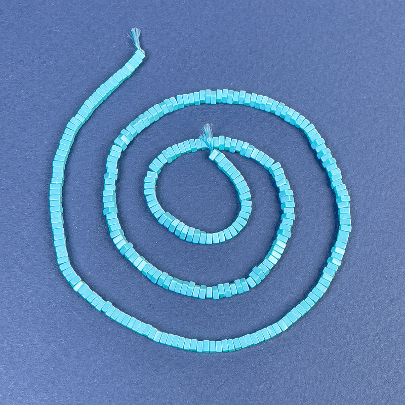 Turquoise Beads (Artificial) Square Rondelle 2.5x1 mm+ on a strand, length 39 cm+