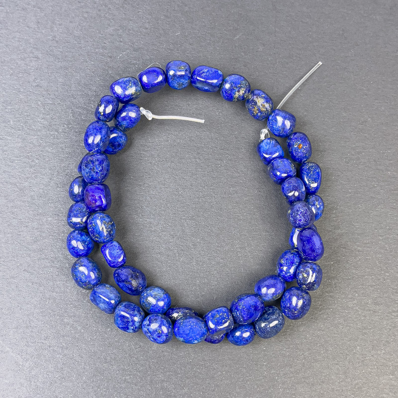 Lapis lazuli beads, faceted 9x7mm on thread, length 40 cm+
