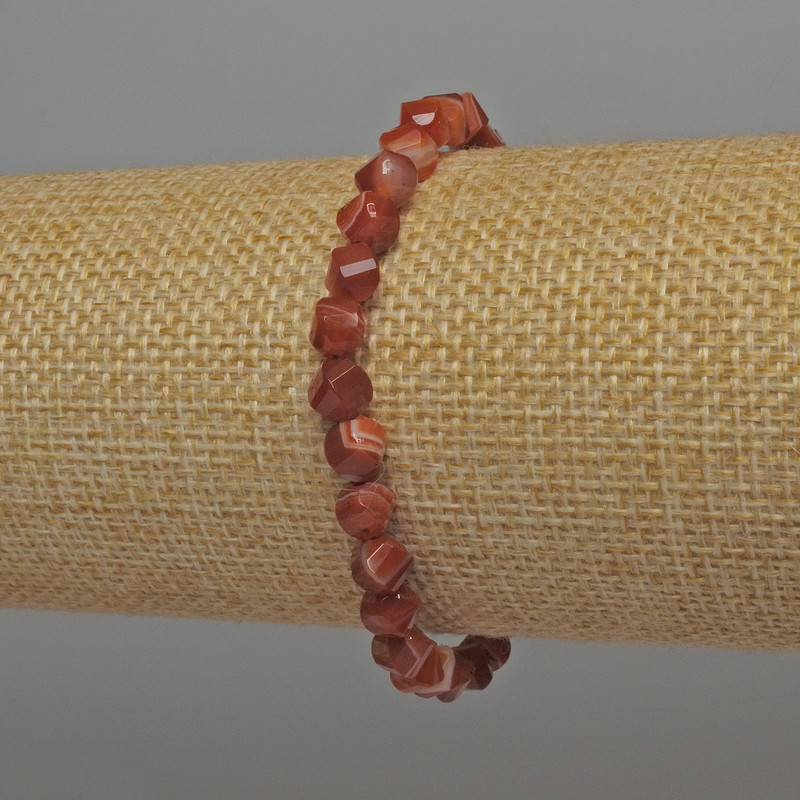 Carnelian bracelet with faceted rhombus beads, 6mm diameter, 18cm length, stretch