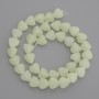 Onyx beads with green glow, heart-shaped, 10x10 mm, on a thread, 36 cm length