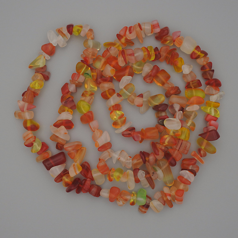 Assorted natural stone beads, chip stones, 7–15×4–6 mm, on a thread, length 80 cm+