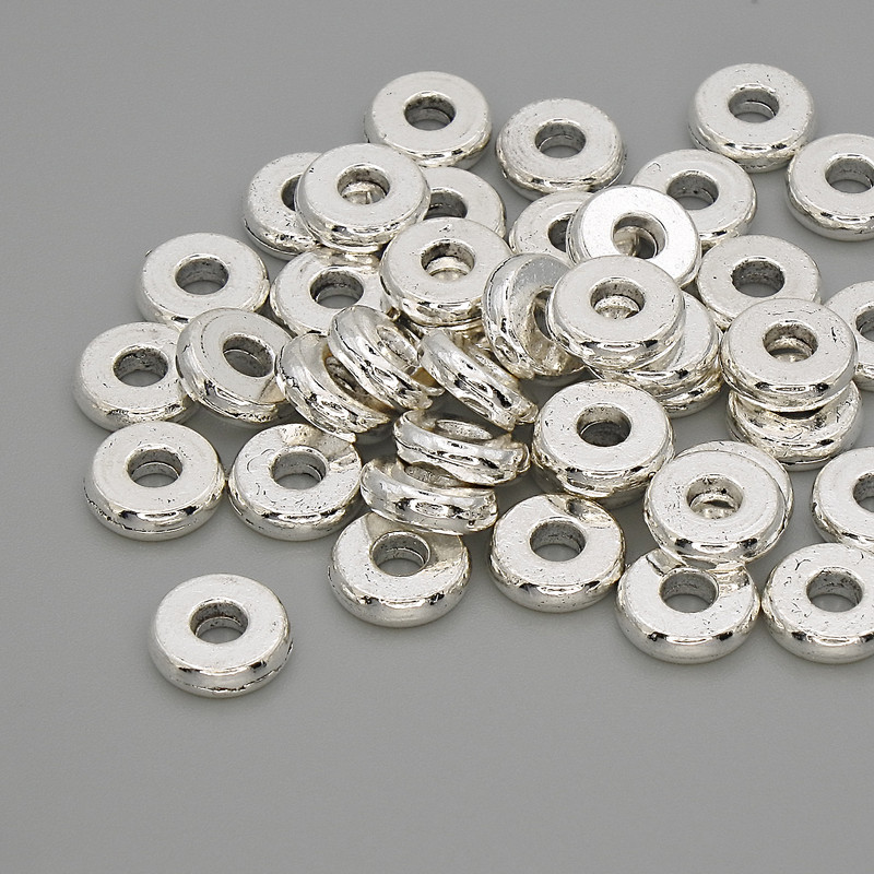 Bead insert, silver-tone color, size about 7.5×2 mm, hole diameter about 2.5 mm, packaging 20 g (approx. 40 pcs)