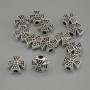 Cross-shaped bead insert finding, silver-colored metal, 11×11×5 mm ±, hole diameter 3 mm ±, packaging 20 g (~13 pcs)