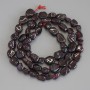 Garnet beads, faceted, diameter 5-8x5-7 mm, length 41 cm on thread