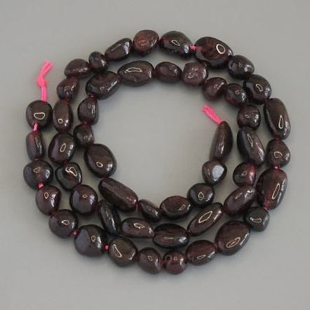 Garnet Beads, Faceted, Diameter 8-12×7-9 mm ± on Thread, Length 40 cm+