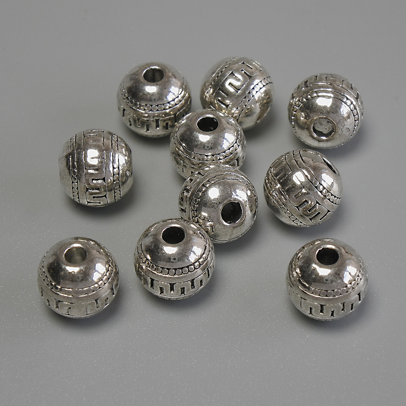 Bead insert finding, silver-colored, 8 mm diameter +- hole, hole diameter 2-3 mm +- packaging 20 g (~ 10 pcs)
