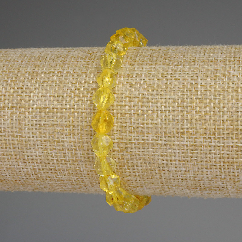 Citrine bracelet with faceted beads, 7x7 mm diameter, 18 cm length, stretch