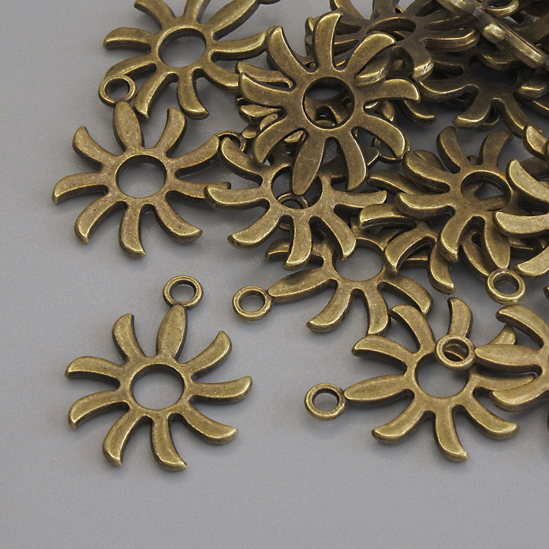 Sun pendant in bronze metal color, diameter 18×15 mm, packaging 22 pcs