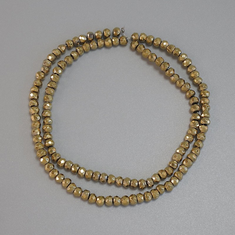 Hematite beads, gold-colored, faceted rondelle 4x3mm on thread, length 38 cm+