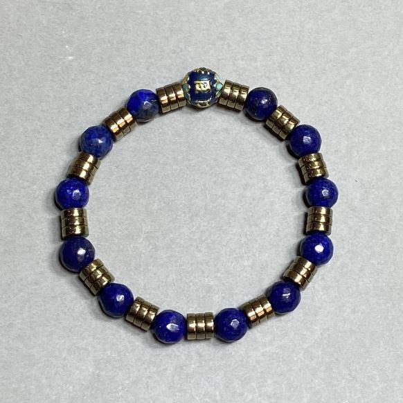 Lapis lazuli bracelet with faceted 8mm beads ± with metal inserts, 18 cm stretch
