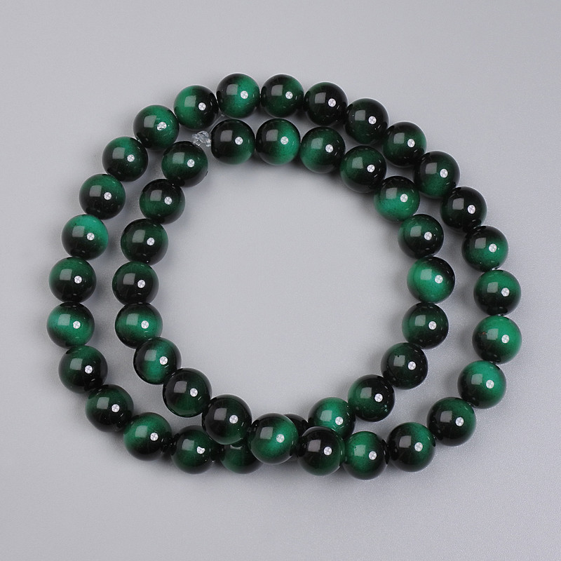Green Tiger's Eye Beads (pressed) Smooth spheres, 8 mm diameter ± on beading line, length 37 cm+