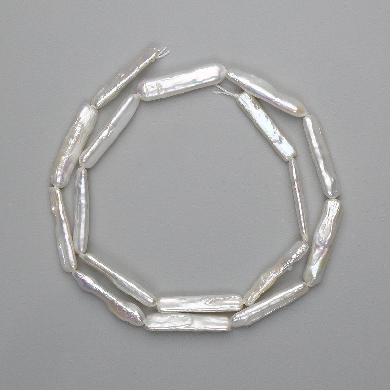 Baroque pearl beads with petrol tint, 23-25×5 mm, 5-6 mm ±, strand length 38 cm