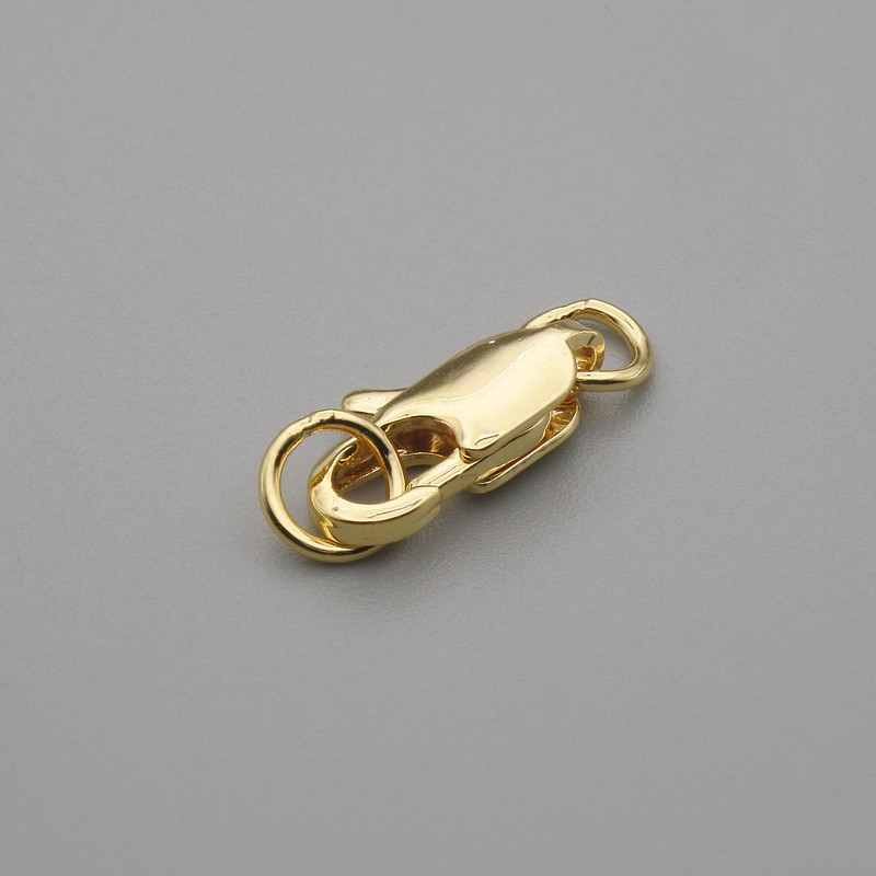Price per piece. Carabiner clasp, 12×4 mm diameter ± gold metal color
