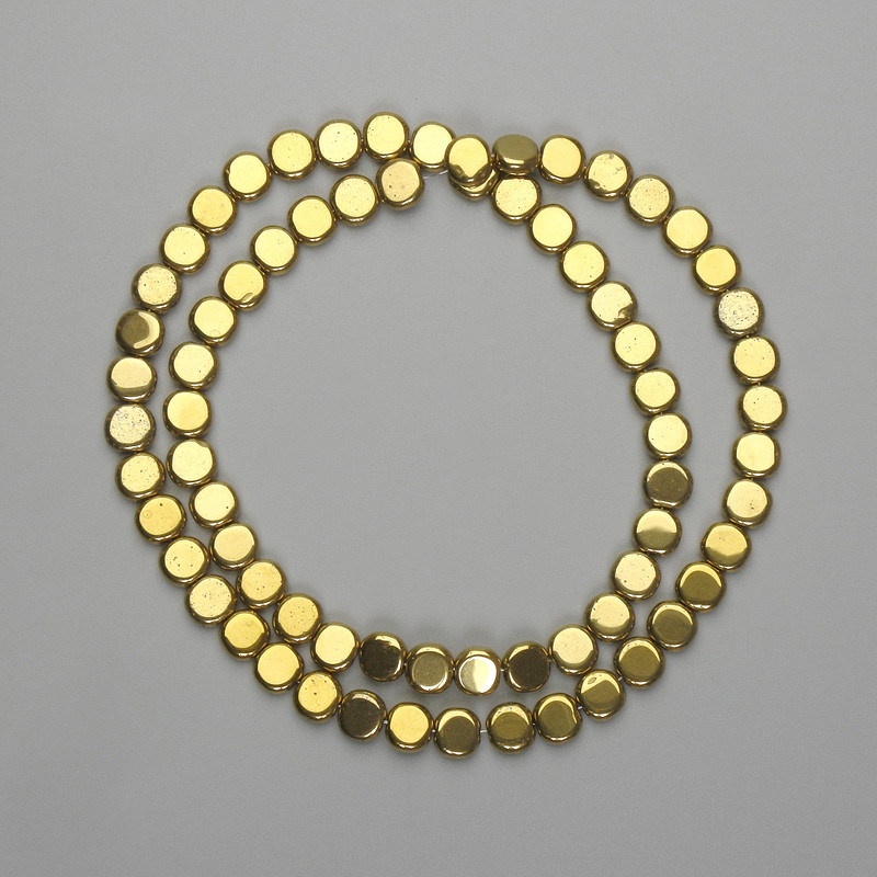 Gold-colored hematite beads, coin-shaped, 6 mm, 38 cm long +/-