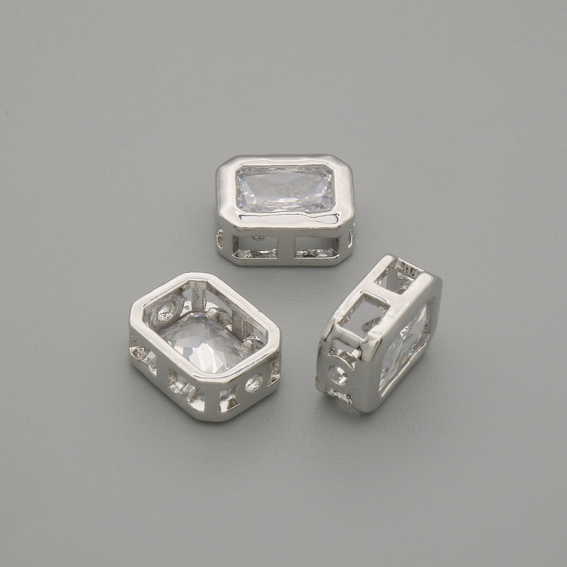 Bead insert with white crystal, silver-tone metal, diameter 9×7 mm ±, hole diameter 1.3 mm ±, per piece