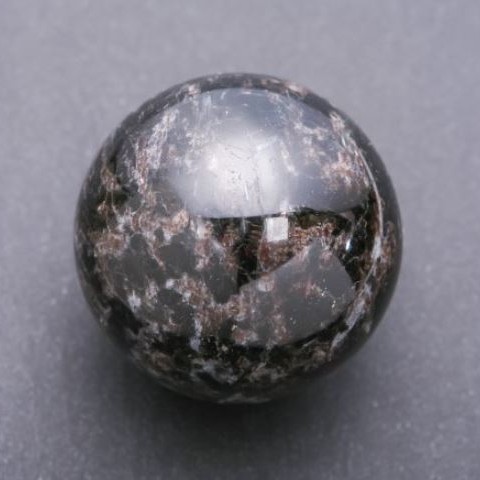 Natural Nuummite sphere, diameter 71 mm ±, weight 583 g