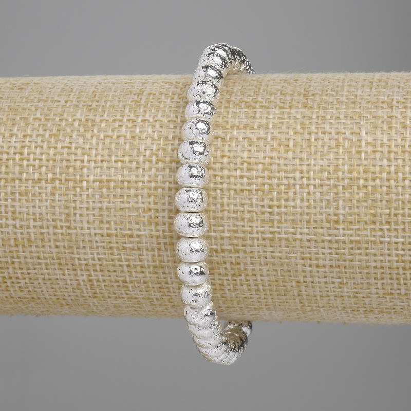 Lava bracelet with a silver-plated finish, porous rondel beads 6x4.5 mm, length 18 cm, stretch