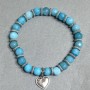 Aquamarine bracelet with faceted 8mm beads, metal inserts, length 18 cm ±, elastic