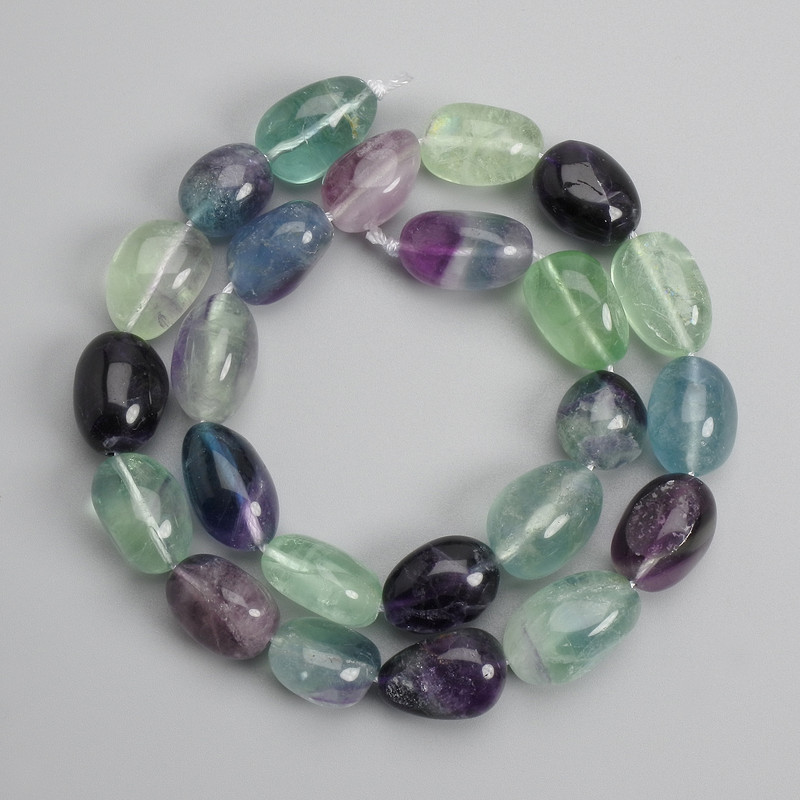 Fluorite faceted beads 13-19×11-13 mm, length ±40 cm on a strand