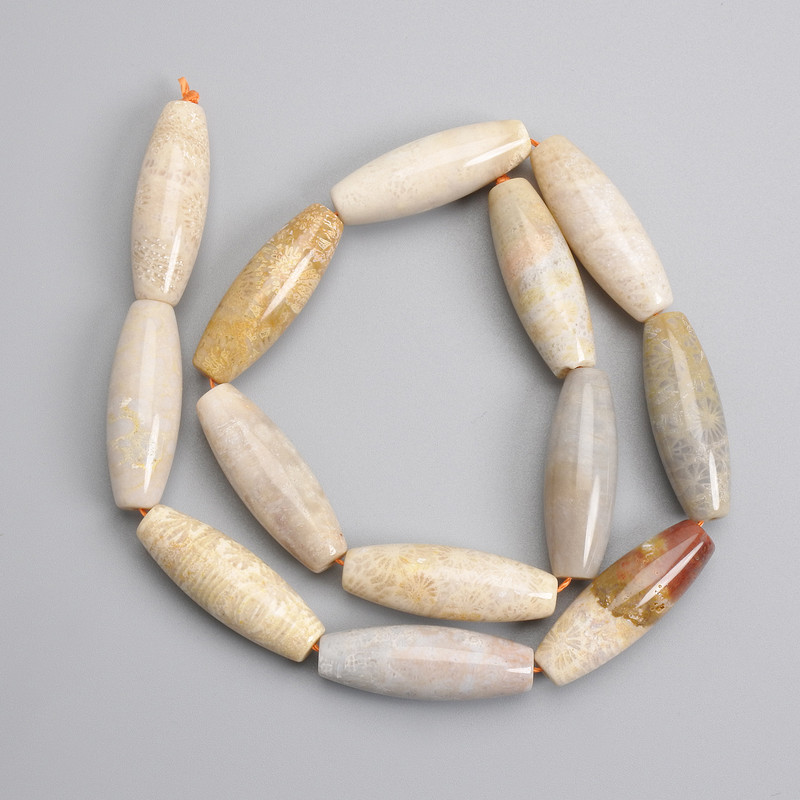 Petrified coral beads, elongated oval 30×10 mm, length approx. 38 cm on thread