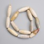 Petrified coral beads, elongated oval 30×10 mm, length approx. 38 cm on thread