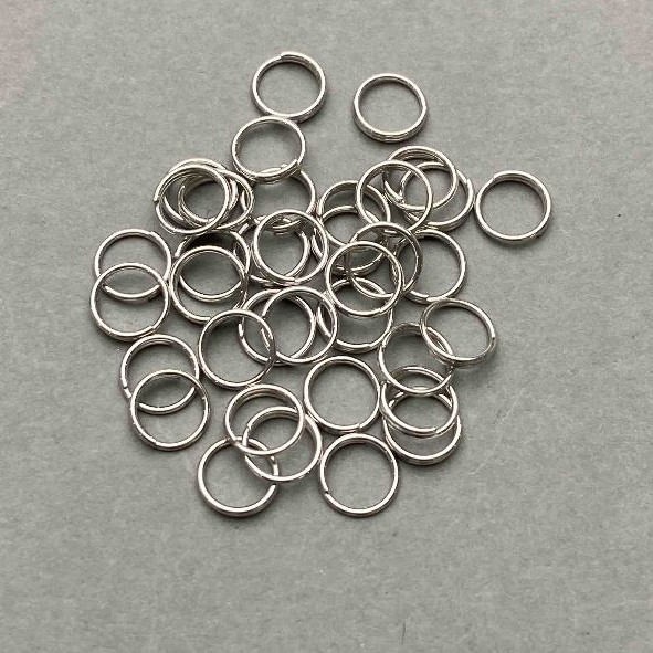 Spring-loaded ring, 7 mm diameter, silver-tone metal, packaging 20 g