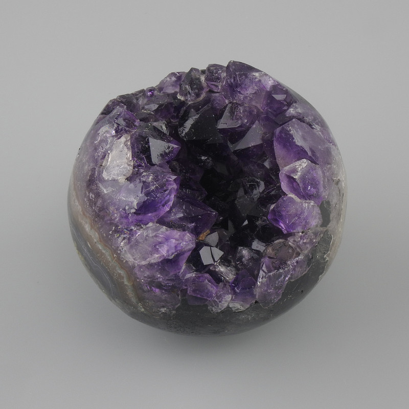 Price per 100 g! Souvenir Amethyst Sphere with Geode, diameter 60-80 mm +/- assorted sizes, weight from 250 g