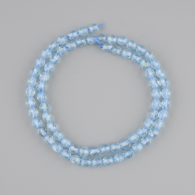 Topaz Beads, Faceted Grain, 5–5.5 mm diameter, 5x5 mm, length approx. 39 cm on a thread