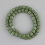 Green lava beads, cylindrical, diameter 8×8 mm ± on thread, length 38 cm+
