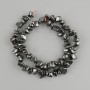 Hematite chip beads, diameter 5–13 mm, 5×4–8 mm ±, length 40 cm ± on a thread