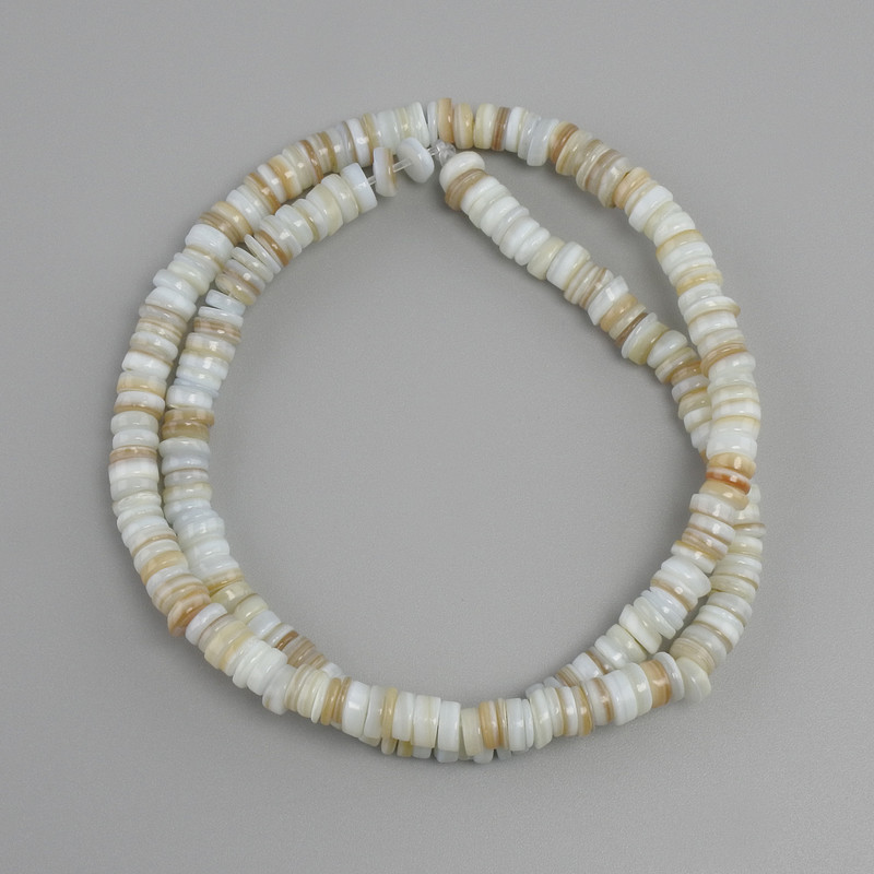 Mother-of-pearl Skafarka shell rondelle beads, 5×1–2 mm, 38 cm long on monofilament