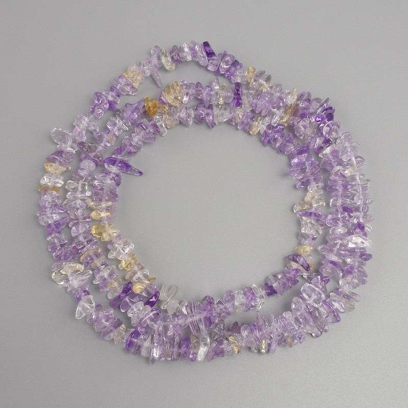 Ametrine chip beads, diameter 6-9 mm, 5x2-5, 5 mm +/-, length about 80 cm +/- on a thread