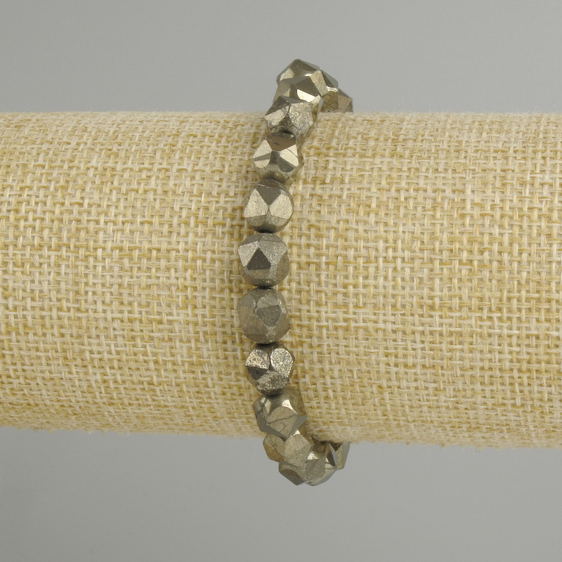 Pyrite bracelet with faceted beads, diameter 8×7 mm ±, length 18 cm ±, stretch