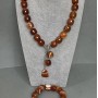 Choker set Dolk carnelian cylinder 15×14 mm +/−, length 41 cm +/− T-bar bracelet, length 18 cm +/− stretch