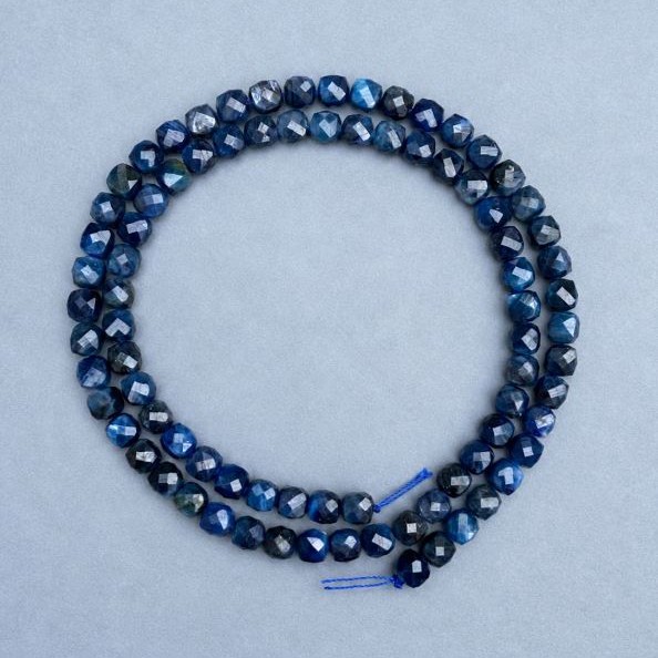 Kyanite beads faceted cube 4.5-5x4.5-5mm +-, length 38cm +/- on a string