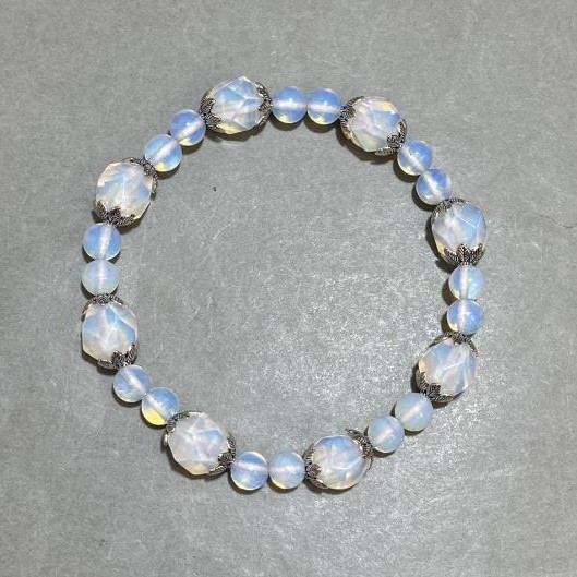 Bracelet Opalite round bead 6mm+- faceted insert 9mm+- with inserts, length 18cm+- stretch