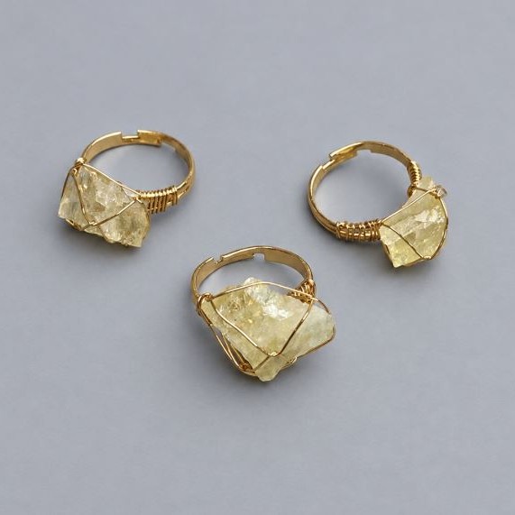 Ring, sizes Citrine natural stone in a woven setting 14-17x9-13mm+- (assorted sizes)