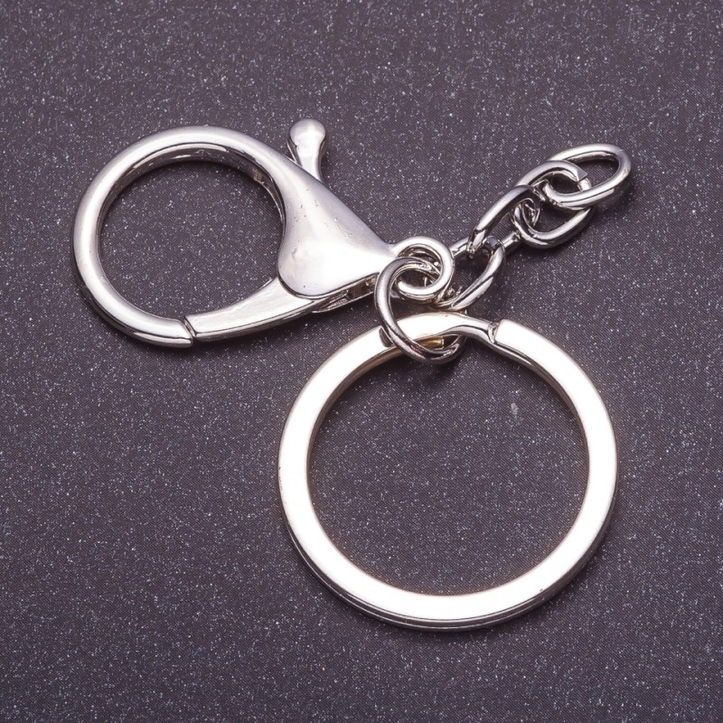 Price per pack / 10 pcs. Keychain base with two attachments: carabiner + ring, diameter 3 cm, length 5 cm