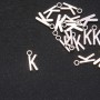 Фурнітура підвіска Буква "K" 17х7мм фасування 20грам (+ - 25шт. )