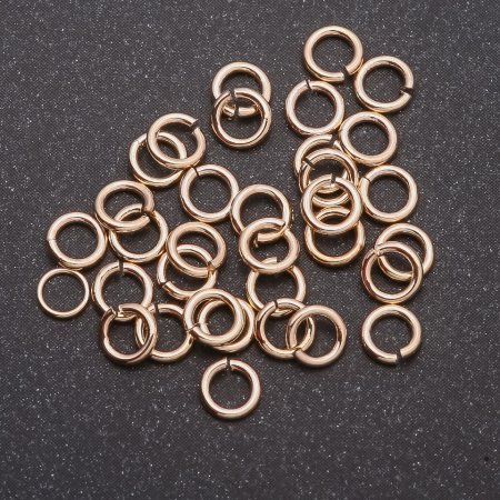 Connecting jump ring, diameter 7×5 mm, metal color 'Light Gold', packaging 1 kg