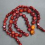 Faceted natural coral beads, diameter 13–19 mm (±), Price per 100 g