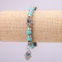 Turquoise amulet bracelet (artificial) with blue 'little eyes' on an elastic cord, diameter 12 (+- ) mm, length 18 cm with inserts and a pendant