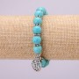 Turquoise talisman bracelet with a blue Eye (single piece) on an elastic band, diameter 10 (±) mm, length 18 cm with inserts and a Tree-shaped charm