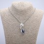 Pendant 'Bird with Ball' 47×18 mm on chain, length 70 cm, silver-toned metal