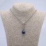 Pendant 'Paw with Ball and Skull' blue 50x16 mm on chain, length 70 cm, silver-colored metal